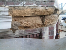 Damages to stone parapet